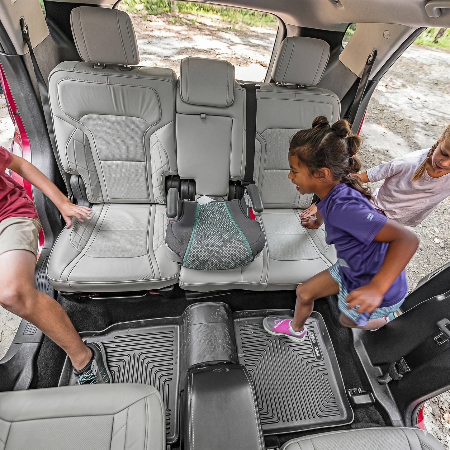 Husky Liners X-act Contour 2nd row floor liner family lifestyle